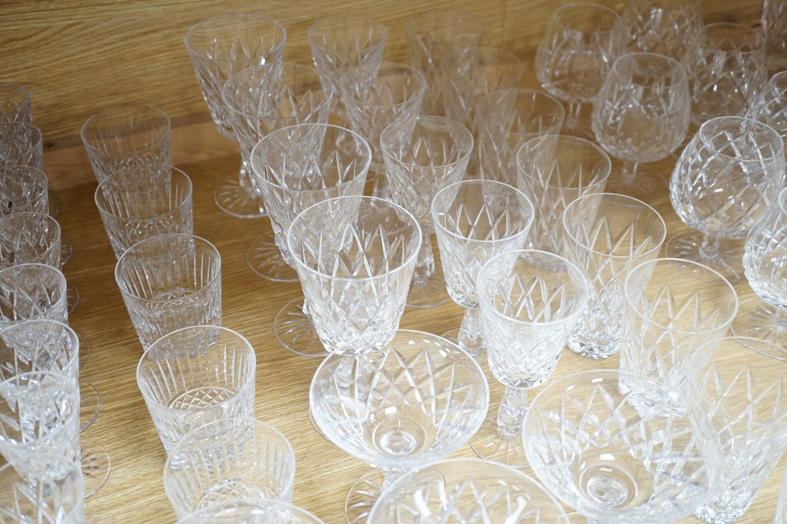 A large comprehensive suite of Waterford Tramore pattern cut crystal drinking glasses